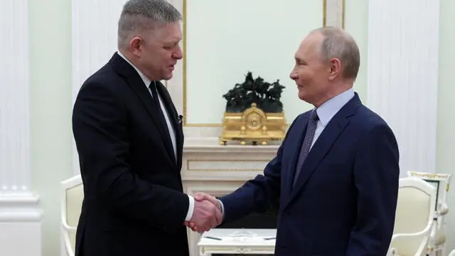 epa11790275 Russian President Vladimir Putin (R) shakes hands with Slovak Prime Minister Robert Fico (L) during their meeting at the Kremlin in Moscow, Russia, 22 December 2024. Fico is on a working visit to Moscow. EPA/GAVRIIL GRIGOROV/SPUTNIK/KREMLIN / POOL