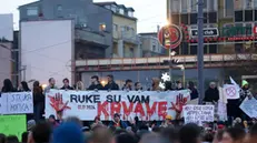 epa11790057 Protesters hold a banner reading 'Your hands are bloodied' during a protest rally in Belgrade, Serbia, 22 December 2024. University students and farmers called on a protest asking for accountability after fifteen people lost their lives in the collapse of the Novi Sad Railway Station canopy on 01 November 2024. The station building, which had been renovated and reopened on 05 July 2024, was undergoing further renovations shortly before the collapse. EPA/ANDREJ CUKIC