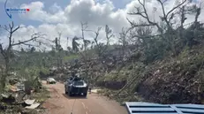 epa11782350 A handout photo made available by the Mayotte Gendarmerie on 17 December 2024 shows a French Gendarmes clearing a road in the French overseas territory of Mayotte, 17 December 2024. Several hundred people may have been killed after tropical cyclone Chido battered the French Indian Ocean territory of Mayotte on 14 December, authorities said. EPA/HANDOUT BEST QUALITY AVAILABLEHANDOUT EDITORIAL USE ONLY/NO SALES