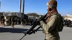 epa11771846 Taliban security stand guard at a checkpoint in Kabul, Afghanistan, 12 December 2024. Khalil Rahman Haqqani, the Taliban government's acting minister of refugees and a senior member of the Haqqani network, was killed in a bomb blast at the ministry building in Kabul on 11 December, resulting in multiple casualties among government employees, police said. EPA/SAMIULLAH POPAL