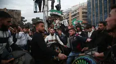 epa11788814 People play drums during the 'Liberation Festival', which celebrates the ouster of Syrian President Bashar Al-Assad, at Saadallah al-Jabiri Square in Aleppo, Syria, 21 December 2024. EPA/BILAL AL HAMMOUD