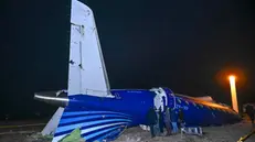 epa11793293 Wreckage of plane passenger plane Embraer ERJ-190AR at the crash site near Aktau, Kazakhstan, 25 December 2024. Azerbaijan Airlines Embraer ERJ-190AR passenger plane flying from Baku to Grozny crashed some three kilometres away from the city of Aktau. According to preliminary information, the incident was caused by a collision between the aircraft and a flock of birds. EPA/STR