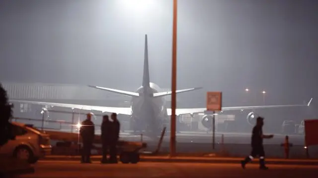 epa04060504 An unidentified airplane stands in park position at Sabiha Gokcen Airport in Istanbul, Turkey 07 February 2014. A man claiming to have a bomb on a Turkish passenger plane leaving Ukraine demanded that the flight be diverted to Sochi, local media reported. The plane, which was carrying 110 passengers when it took off from Kharkiv, later landed safely at Istanbul's Sabiha Gokcen airport. EPA/TOLGA BOZOGLU