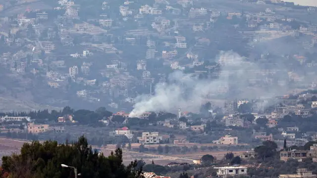 epa11756526 Smoke rises as a result of an Israeli strike next to the south Lebanon village of Hula as seen from the Israeli side of the border, 04 December 2024. A 60-day ceasefire agreement between Israel and Hezbollah came into force on 27 November. EPA/ATEF SAFADI