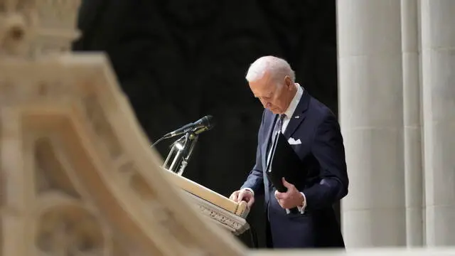 epa10401801 United States President Joe Biden completes his remarks at a memorial service for former US Secretary of Defense Ashton Baldwin Carter in the Washington National Cathedral in Washington, DC, USA, 12 January 2023. EPA/Chris Kleponis - Pool via CNP / POOL