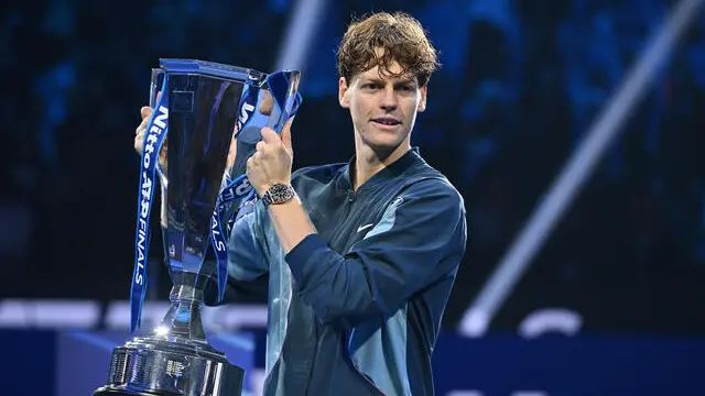 Italy's Jannik Sinner lifts the trophy after winning the final against USA's Taylor Fritz at the ATP Finals tennis tournament in Turin, Italy, 17 November 2024. ANSA/ALESSANDRO DI MARCO