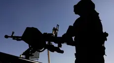 epa11795115 A Houthi soldier mans a machine gun on a vehicle while on patrol during an anti-US and anti-Israel protest in Sana'a, Yemen, 27 December 2024. Thousands of Houthi supporters gathered in Sana'a to protest against the United States and Israel a day after Israel airstrikes targeted key facilities in the Yemeni cities of Sana'a and Hodeidah under the control of the Houthis, killing at least six people and wounding 40 others, the Houthi-controlled Health Ministry has reported. EPA/YAHYA ARHAB