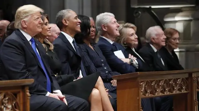 epa07210647 (L-R) US President Donald J. Trump, first lady Melania Trump, former US President Barack Obama, former first lady Michelle Obama, former US President Bill Clinton, former Secretary of State Hillary Clinton, and former US President Jimmy Carter and former first lady Rosalynn Carter, listen during a State Funeral at the National Cathedral, in Washington, DC, USA, 05 December 2018. George H. W. Bush, the 41st President of the United States (1989-1993), died in his Houston, Texas, USA, home surrounded by family and friends on 30 November 2018. The body will return to Houston for another funeral service before being transported by train to the George Bush Presidential Library and Museum for internment. EPA/ALEX BRANDON / POOL