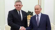 epa11790277 Russian President Vladimir Putin (R) shakes hands with Slovak Prime Minister Robert Fico (L) during their meeting at the Kremlin in Moscow, Russia, 22 December 2024. Fico is on a working visit to Moscow. EPA/GAVRIIL GRIGOROV/SPUTNIK/KREMLIN / POOL