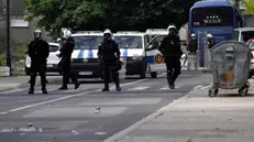 epa09448735 Montenegro riot police guard road during a protest against the enthronement of the Serbian Orthodox bishop in Cetinje, Montenegro, 05 September 2021. The enthronement of the new bishop of the Serbian Orthodox Church in Montenegro is causing a divide in Montenegro, sparking tensions between the members of the Serbian orthodox church and protestors who are opposing the ceremony taking place in the former Montenegrin royal capital. EPA/BORIS PEJOVIC