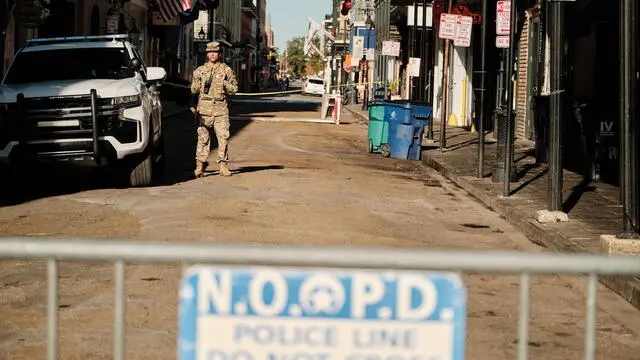 epa11802496 Louisiana National Guard stands guard at a gated off area of the French Quarter near the scene of the car ramming on Bourbon Street in New Orleans, Louisiana, USA, 02 January 2025. At least 15 people are dead and 35 injured after the driver of a white pickup truck slammed into a crowd of people on Bourbon Street on 01 January 2025 and then opened fire with a gun. The FBI identified the driver as Shamsud-Din Jabbar, a US citizen from Texas and Army veteran. He was killed in a shootout with police. EPA/DAN ANDERSON