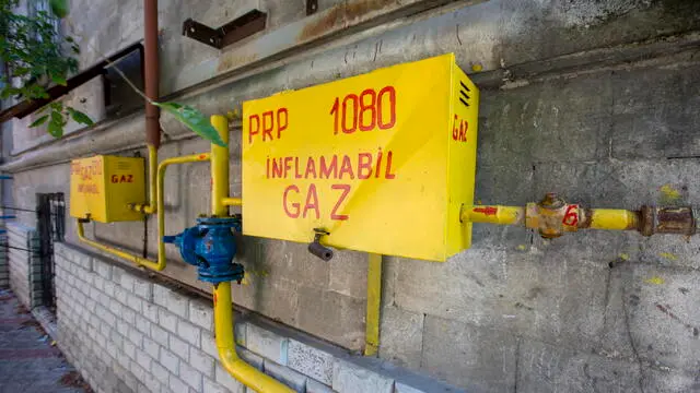 epa10850595 A gas panel is pictured on a building in downtown Chisinau, Moldova, 09 September 2023. Moldova is facing an energy crisis due to a disagreement between Moldova and Russia over gas supplies by Russian oil and gas company Gazprom and debt repayment by Moldova. On 06 September 2023, Moldova's Minister of Energy Parlicov addressed the government's plans to protect gas consumers following an audit of historical debts allegedly owed to Moldova-Gaz, a Gazprom subsidiary in Moldova, based on which Moldovan authorities are disputing debt claims made by Moldovagaz. Furthermore, at the beginning of 2024, Ukraine may terminate the transit of Russian gas, which could affect the gas supply of Transnistria, a breakaway region of Moldova, adding to the former Soviet country's fraught energy supply situation. EPA/DUMITRU DORU