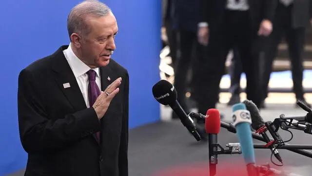 epa11707000 Turkish President Recep Tayyip Erdogan talks to the press upon arrival to the 5th summit of the European Political Community (EPC) in Puskas Arena in Budapest, Hungary, 07 November 2024. EPA/SZILARD KOSZTICSAK HUNGARY OUT