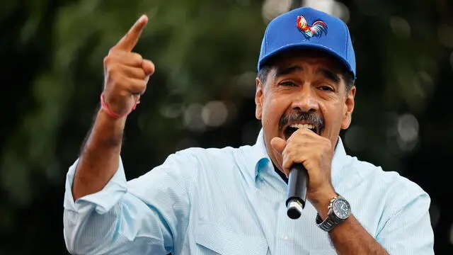 epa11553784 The president of Venezuela, Nicolas Maduro, speaks during a pro-government rally in Caracas, Venezuela, 17 August 2024. Maduro asked Parliament to approve 'very quickly' the law against fascism, neo-fascism and hate crimes, which contemplates, among other things, sanctioning those who promote acts of 'violence' in the country, a product of 'intolerance.' EPA/MIGUEL GUTIERREZ