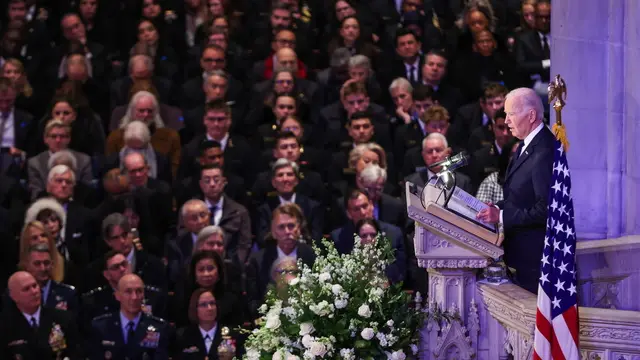 epa11815347 US President Joe Biden (R) delivers a eulogy during the State Funeral services of former US President Jimmy Carter at the National Cathedral in Washington, DC, USA, 09 January 2025. Carter, the 39th US president, died at age 100 in his hometown of Plains, Georgia, on 29 December 2024. EPA/SAMUEL CORUM / POOL