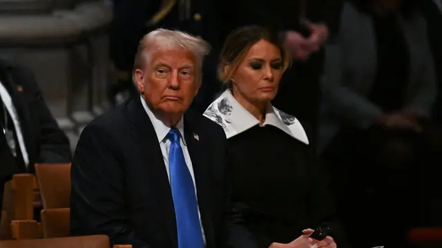 epa11815101 US President-elect Donald Trump (L) and his wife Melania (R) attend the state funeral services for former US President Jimmy Carter at the National Cathedral in Washington, DC, USA, 09 January 2025. Carter, the 39th US president, died at age 100 in his hometown of Plains, Georgia, on 29 December 2024. EPA/RICKY CARIOTI / POOL