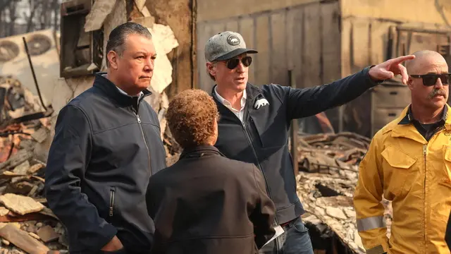 epa11813729 Democratic US Senator Alex Padilla of California (L), Los Angeles Mayor Karen Bass (2-L) and California Governor Gavin Newsom (2-R) tour an area damaged by the Palisades wildfire in the Pacific Palisades neighborhood of Los Angeles, California, USA, 08 January 2025. According to data from California Department of Forestry and Fire Protection, CAL FIRE, multiple wildfires are burning across thousands of acres and forced tens of thousands of evacuations in the Los Angeles area. EPA/ALLISON DINNER