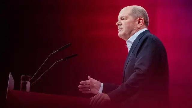 epa11818253 German Chancellor Olaf Scholz delivers a speech at the convention of Germany's Social Democratic Party (SPD) in Berlin, Germany, 11 January 2025. The SPD kicks off the critical phase of the election campaign and officially elects Olaf Scholz as its candidate for chancellor in the general elections to be held on 23 February 2025. EPA/CHRISTOPH SOEDER