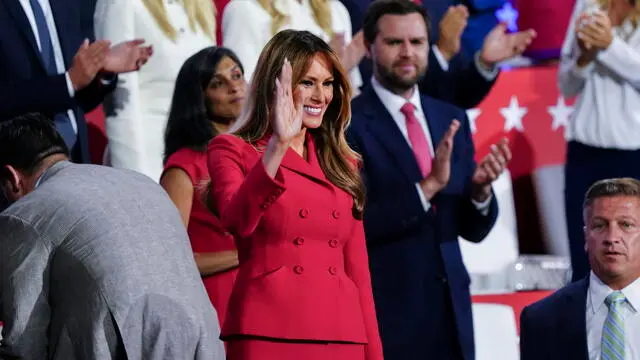 epa11486599 Former First Lady Melania Trump, with Republican vice presidential nominee Senator JD Vance (R), arrives to the VIP box during the final day of the Republican National Convention (RNC) at the Fiserv Forum in Milwaukee, Wisconsin, USA, 18 July 2024. The convention comes just a few days after a 20-year-old Pennsylvania man attempted to assassinate former President and current Republican presidential nominee Donald Trump. The RNC is being held 15 to 18 July 2024 and is where delegates from the Republican Party select their nominees for president and vice president in the 2024 US presidential election. EPA/SHAWN THEW