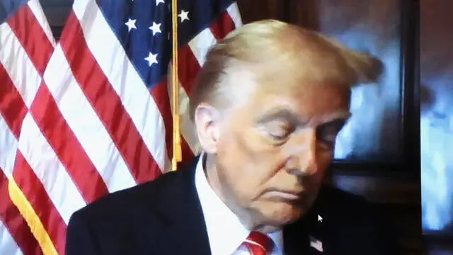 epa11816976 US President-elect Donald Trump appears on a creen remotely for a sentencing hearing in the criminal case in which he was convicted in 2024 on charges involving hush money paid to a porn star, at New York Criminal Court in Manhattan in New York City, USA, 10 January 2025. Trump was sentenced by the court's Justice to unconditional discharge. EPA/Brendan McDermid / POOL