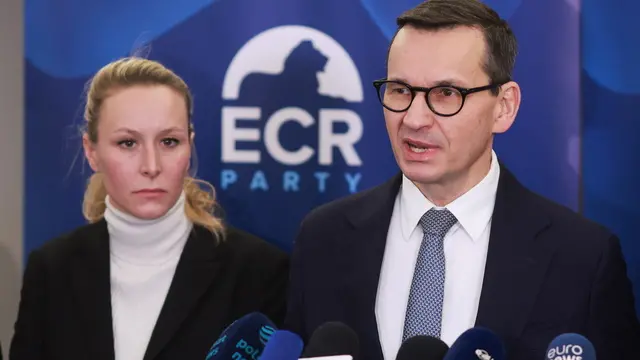 epa11823900 Former Polish prime minister Mateusz Morawiecki (R) speaks next to French MEP Marion Marechal Le Pen during a press conference with members of the ECR board after his election as the new president of the European Conservatives and Reformists Group (ECR Group) in Brussels, Belgium, 14 January 2025. Morawiecki takes over from Italian Prime Minister Meloni who announced to step down at the end of 2024 and backed him as her successor. EPA/OLIVIER HOSLET