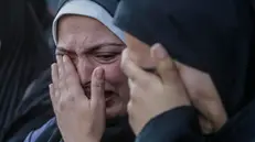 epa11825781 A Palestinian woman weeps as they mourn the members of a Palestinian family killed in an Israeli airstrike, at Al Aqsa Martyrs Hospital in Deir Al Balah town, central Gaza Strip, 15 January 2025. According to the Palestinian Ministry of Health in Gaza, at least 11 Palestinians were killed following an overnight Israeli airstrike in Deir Al Balah, central Gaza. More than 46,500 Palestinians and over 1,400 Israelis have been killed, according to the Palestinian Health Ministry and the Israeli Army, since Hamas militants launched an attack against Israel from the Gaza Strip on 07 October 2023, and the Israeli operations in Gaza and the West Bank which followed it. EPA/MOHAMMED SABER