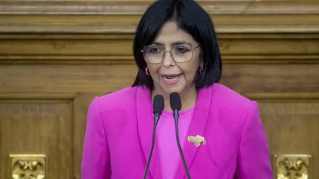 epa11315594 Executive Vice President of Venezuela Delcy Rodriguez speaks during a session of the National Assembly in Caracas, Venezuela, 02 May 2024. Venezuela's National Assembly, with a large pro-government majority, approved on May 2 the creation of a law proposed by Rodriguez which aims, according to authorities, to protect pensions against the effects of the 'criminal blockade' imposed by the United States. EPA/MIGUEL GUTIERREZ