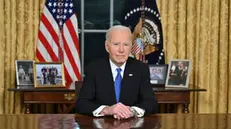 epa11827585 US President Joe Biden looks on after he delivered his farewell address to the nation from the Oval Office of the White House in Washington, DC, USA, 15 January 2025. EPA/MANDEL NGAN / POOL