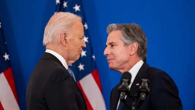 epa11822448 US President Joe Biden (L) shakes hands with Secretary of State Antony Blinken (R) as Biden prepares to deliver the last foreign policy speech of his presidency at the State Department in Washington, DC, USA, 13 January 2025. Biden emphasized the value of foreign alliances, including with NATO, stating that the US is 'in a fundamentally better place than it was four years ago.' EPA/JIM LO SCALZO