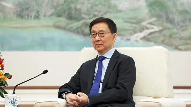 epa11817769 Chinese Vice President Han Zheng attends a meeting with Britain's Chancellor of the Exchequer Rachel Reeves (not pictured) at the Great Hall of the People in Beijing, China, 11 January 2025. EPA/FLORENCE LO / POOL