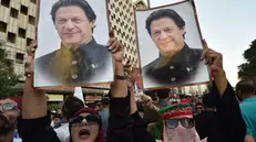 epa11687136 Supporters of former prime minister and chairman of opposition party Pakistan Tehreek-e-Insaf (PTI), Imran Khan, participate in a protest demanding his release in Lahore, Pakistan, 27 October 2024. The Pakistan Tehreek-e-Insaf (PTI) protested against the 26th Constitutional Amendment Bill, which they claim has compromised the independence of the judiciary and the over year-long imprisonment of Khan. EPA/SHAHZAIB AKBER