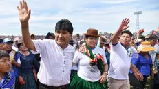 epa11784587 Former Bolivian President Evo Morales (L) walks with supporters during an event at the Chimore stadium, Bolivia, 18 December 2024. A crowd of Morales' supporters proclaimed him as the 'sole candidate' for the 2025 elections, even if he is imprisoned over the aggravated human trafficking case for which there is an arrest warrant against him. EPA/Jorge Abrego