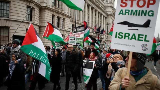 epa11834250 Pro-Palestinian activists march up Whitehall in London, Britain, 18 January 2025. Protesters demand the end of Israeli operations in the Gaza Strip and for the British government to end to all arms trade with Israel. A plan for a protest march was changed by the Metropolitan Police through their powers under the Public Order Act as it was due to pass a synagogue in central London. EPA/DAVID CLIFF