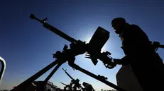 epa11828131 Armed tribesmen man machine guns on vehicles during an anti-USA and anti-Israel gathering mobilizing more Houthi fighters, on the outskirts of Sana'a, Yemen, 16 January 2025. Yemen's Houthis have been recruiting more fighters as part of a mobilization campaign for a possible confrontation with the United States and Israel amid an escalation of Houthi missile-drone attacks on Israel and shipping lanes in the seas around Yemen in retaliation for Israel's military operation in Gaza. EPA/YAHYA ARHAB