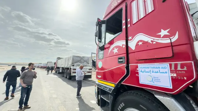 epaselect epa11835749 Trucks carrying humanitarian aid bound for the Gaza Strip wait near Al-Arish to go to Rafah border crossing between the Gaza Strip and Egypt, 19 January 2024, before a ceasefire in Gaza is set to come into effect. Israel and Hamas agreed on a hostage release deal and a Gaza ceasefire to be implemented on 19 January 2025. More than 46,000 Palestinians have been killed in the Gaza Strip, according to the Palestinian Ministry of Health, since Israel launched a military campaign in the strip in response to a cross-border attack led by the Palestinian militant group Hamas on 07 October 2023, in which about 1,200 Israelis were killed and more than 250 taken hostage. EPA/MOHAMED HOSSAM