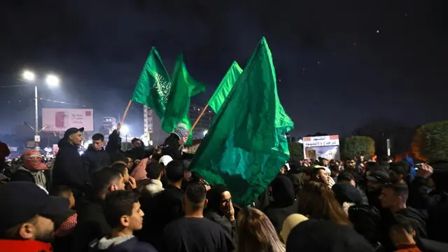 epa11837465 Palestinians wait for the release of relatives from the West Bank military prison of Ofer, in the West Bank city of Ramallah, ahead of the release of Palestinian prisoners in the Israel-Hamas release deal 19 January 2025, amid a ceasefire between Israel and Hamas. Israel and Hamas agreed on a hostage release deal and a Gaza ceasefire to be implemented on 19 January 2025. More than 46,000 Palestinians have been killed in the Gaza Strip, according to the Palestinian Ministry of Health, since Israel launched a military campaign in the strip in response to a cross-border attack led by the Palestinian militant group Hamas on 07 October 2023, in which about 1,200 Israelis were killed and more than 250 taken hostage. EPA/ALAA BADARNEH