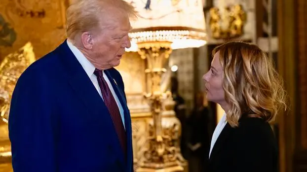 This handout picture released by the Chigi Palace Press Office on 05 January 2025 shows Italian Prime Minister Giorgia Meloni meeting with US President-elect Donald Trump at his residence at Mar-a-Lago in Palm Beach, Florida, on 04 January 2025. ANSA/ CHIGI PALACE PRESS OFFICE/ FILIPPO ATTILI +++ ANSA PROVIDES ACCESS TO THIS HANDOUT PHOTO TO BE USED SOLELY TO ILLUSTRATE NEWS REPORTING OR COMMENTARY ON THE FACTS OR EVENTS DEPICTED IN THIS IMAGE; NO ARCHIVING; NO LICENSING +++ NPK +++