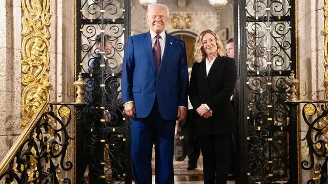 This handout picture released by the Chigi Palace Press Office on 05 January 2025 shows Italian Prime Minister Giorgia Meloni meeting with US President-elect Donald Trump at his residence at Mar-a-Lago in Palm Beach, Florida, on 04 January 2025. ANSA/ CHIGI PALACE PRESS OFFICE/ FILIPPO ATTILI +++ ANSA PROVIDES ACCESS TO THIS HANDOUT PHOTO TO BE USED SOLELY TO ILLUSTRATE NEWS REPORTING OR COMMENTARY ON THE FACTS OR EVENTS DEPICTED IN THIS IMAGE; NO ARCHIVING; NO LICENSING +++ NPK +++