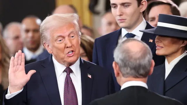 epa11839250 Donald Trump is sworn in as the 47th US President in the US Capitol Rotunda in Washington, DC, USA, 20 January 2025. EPA/KEVIN LAMARQUE / POOL