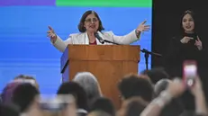 epa10724959 The Minister of Women of Brazil, Cida Goncalves (C) delivers a speech during the sanctioning ceremony of the law that establishes equal pay between women and men, at the Military Air Base of Brasilia, Brazil, 03 July 2023. Brazilian President Lula da Silva sanctioned a law that establishes equal pay for men and women who perform the same functions and assured that the Brazilian Government will guarantee that it is strictly complied with. EPA/Andre Borges