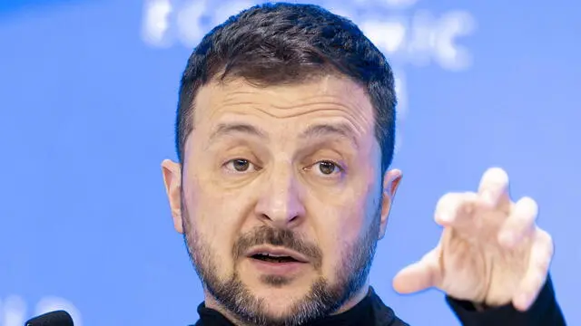 epa11842115 Ukrainian President Volodymyr Zelensky gestures as he speaks at a plenary session during the 55th annual World Economic Forum (WEF) meeting in Davos, Switzerland, 21 January 2025. The World Economic Forum's annual meeting gathers entrepreneurs, scientists, and corporate and political leaders in Davos from January 20 to 24.Â EPA/MICHAEL BUHOLZER