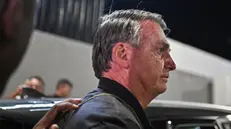 epa11740683 Brazil's former President Jair Bolsonaro leaves Juscelino Kubitschek International Airport after giving a press conference, in Brasilia, Brazil, 25 November 2024. EPA/Andre Borges