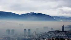 epa11079432 A general view of the surroundings of the city of Sarajevo, Bosnia and Herzegovina, 15 January 2024. With an AQI (Air Quality Index) of 166, which is labeled as 'unhealthy', the Bosnian capital is among the most polluted cities in the world, ranking in 7th place on 15 January 2024. EPA/FEHIM DEMIR