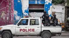 epa11792612 Police officers patrol a street after attack on a public hospital in Port-au-Prince, Haiti, 24 December 2024. Armed individuals belonging to the Vivre Ensemble (Living Together) coalition attacked Port-au-Prince's General Hospital, killing at least two journalists and a policeman. EPA/Johnson Sabin