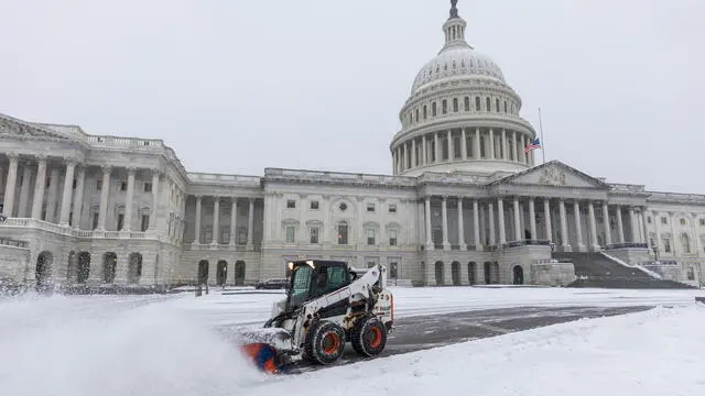 epa11809495 A snowplow clears snow from outside the US Capitol as lawmakers gather to certify President-elect Trump's election victory in Washington, DC, USA, 06 January 2025. The certification comes exactly four years after a mob of Trump-supporting insurrectionists stormed the Capitol, attempting to disrupt the certification of US President Joe Biden. EPA/JIM LO SCALZO