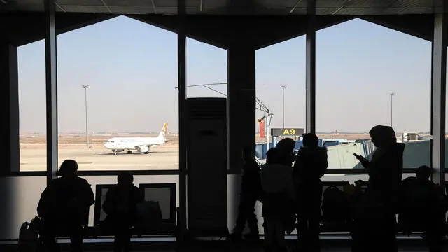 epa11811247 Passengers wait in the lounge at Damascus International Airport in Damascus, Syria, 07 January 2025. Syria's main airport in Damascus resumed international flights on 07 January for the first time following the ouster of former President Bashar al-Assad last month. EPA/BILAL AL HAMMOUD