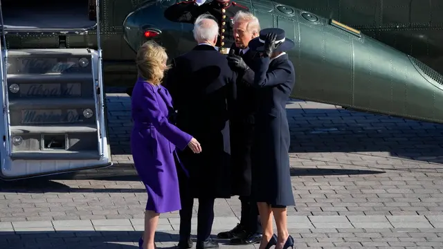 epa11840215 US President Donald Trump (2-R) and first lady Melania Trump (R) say goodbye to former President Joe Biden (2-L) and former first lady Jill Biden (L), as they walk towards Marine One during the 2025 Presidential Inauguration at the U.S. Capitol in Washington, DC., USA, 20 January 2025. US President-elect Donald Trump was sworn in for a second term as president of the United States on 20 January. The presidential inauguration will be held indoors due to extreme cold temperatures in DC. EPA/JACK GRUBER / POOL