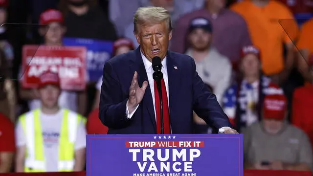 epa11701968 Republican presidential candidate and former US President Donald Trump speaks during a campaign rally in Grand Rapids, Michigan, USA, 04 November 2024. Trump and Vice President and Democratic presidential nominee Kamala Harris are tied in the polls with one day until the election of 05 November. EPA/CJ GUNTHER