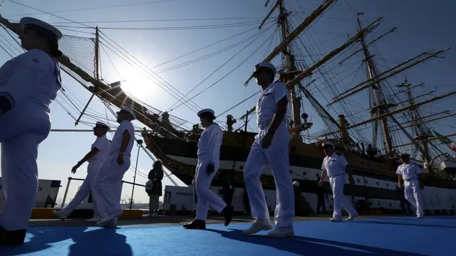 epa11795839 Crew sailors walk during the welcoming ceremony of the Amerigo Vespucci ship at Zayed port in Abu Dhabi, United Arab Emirates , 28 December 2024. Amerigo Vespucci, Italian Navyâ€™s historic and iconic Training Ship, Ambassador of UNESCO, UNICEF and Italy will be docked in Abu Dhabi until 31 December as part of tour around the world, visiting over 30 ports across 5 continents. EPA/ALI HAIDER