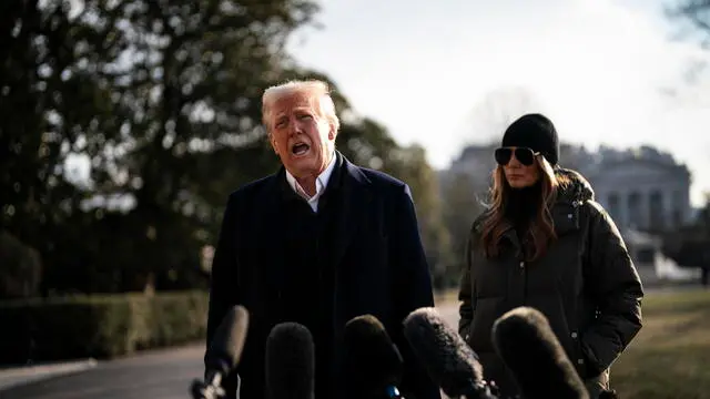 epa11849922 US First Lady Melania Trump (R) watches as US President Donald Trump speaks to members of the media on the South Lawn of the White House before boarding Marine One in Washington, DC, USA, 24 January 2025. Trump will head to Los Angeles to survey wildfire damage after visiting North Carolina, which was recently hit by hurricanes. EPA/AL DRAGO / POOL